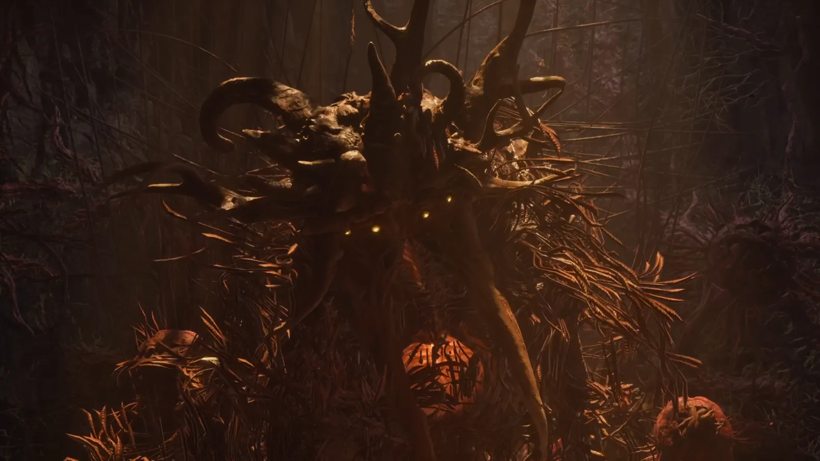 The Prophet, a towering Overlord with glowing red eyes, prepares to strike in the Shattered Rise biome